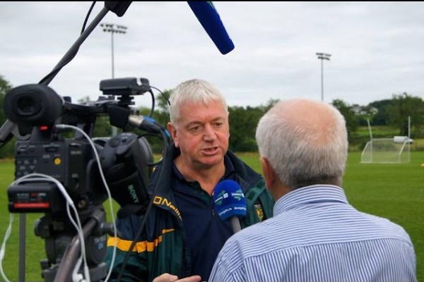 John Hession being interviewed pitch-side with the Donegal Ladies senior GAA team